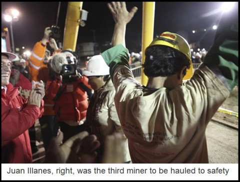 Juan Illanes, right, was the third miner to be hauled to safety
